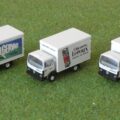 Cinq camions Renault JN90 diverses livrées