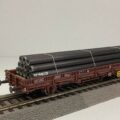 Roco - Wagon plat avec chargement de tuyaux - 47622